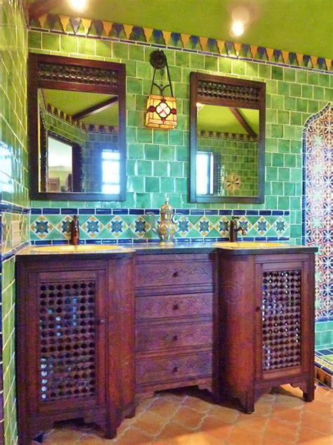 Handmade mexican tiles, painted talavera murals for kitchen backsplash and counter, bathroom shower wall and decorative relief ceramic tiles for stair risers. Moroccan themed bathroom using Turkish, Moroccan and ...