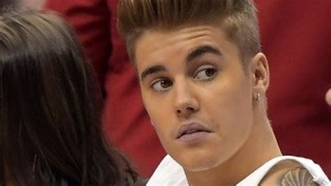 justin bieber gets two years probation for vandalism bbc news