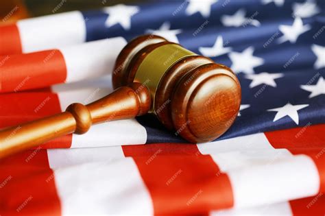 Premium Photo | Judge's gavel on the table in focus cropped view of