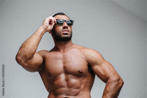 A Sexy Athlete With A Naked Torso Is Wearing Glasses Rest Healthy