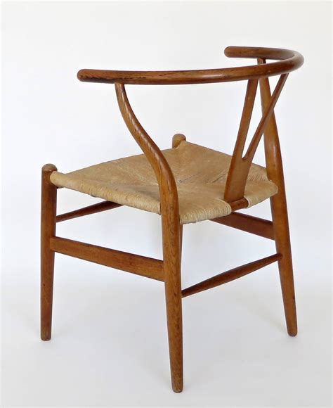 It was produced for the first time in 1950 and has been produced. Image result for wegner wishbone chair
