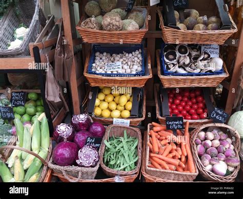 fruit and vegetables many grown on the island for sale at a greengrocers stall at the