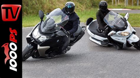 A swingarm, not a swing mount, pushes the burgman more toward a proper motorcycle and less like a scooter. Suzuki Burgman 650 vs BMW C 650 GT | Scooter Battle - YouTube
