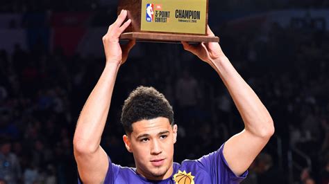 Devin booker is a professional american basketball player who plays for the 'national basketball association' (nba) team 'phoenix suns.' he was born to famous basketball player melvin booker. Devin Booker Wins 2018 NBA 3-Point Contest: Full Scores ...