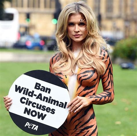 Joanna Krupa Bares All In Tiger Bodypaint Outside British Parliament For PETA Campaign To Ban