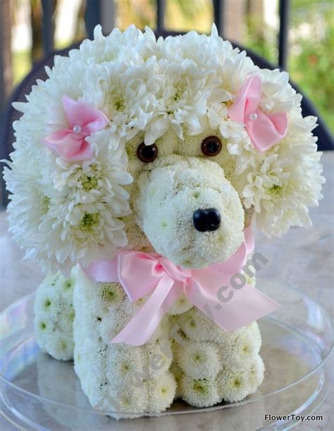 For a stronger solution, just mix a cup of white vinegar with two cups of apple cider vinegar in a spray bottle. Dogs Made Out Of Flowers | TcWorks.Org