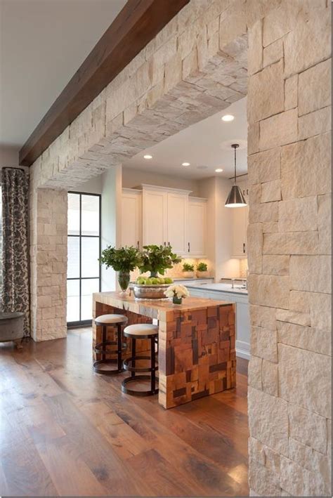 15 Elegant Stone Wall Interior Designs Decoratoo Stone Wall