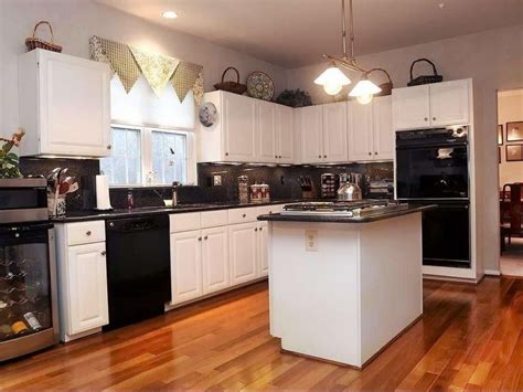 We want to replace our appliances. kitchen design ideas black appliances | White kitchen ...