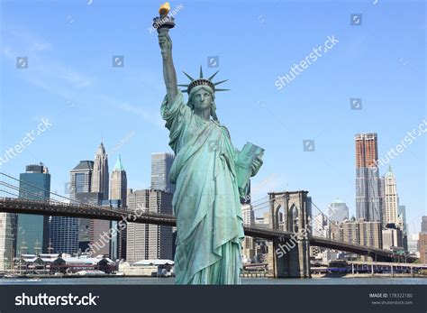 Brooklyn Bridge And The Statue Of Liberty New York City Stock Photo