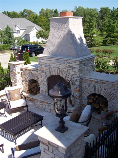 A Beautiful Outdoor Fireplace With Large Sitting Area Backyard