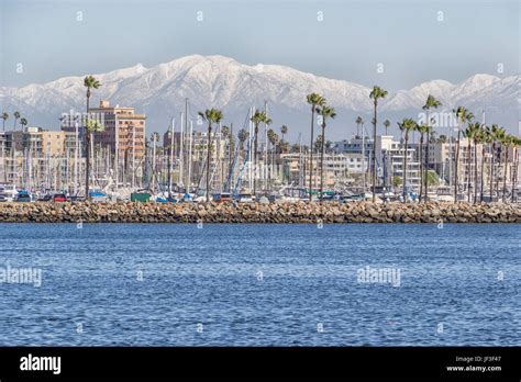 Long Beach, California, harbor and skyline, with snow-capped San