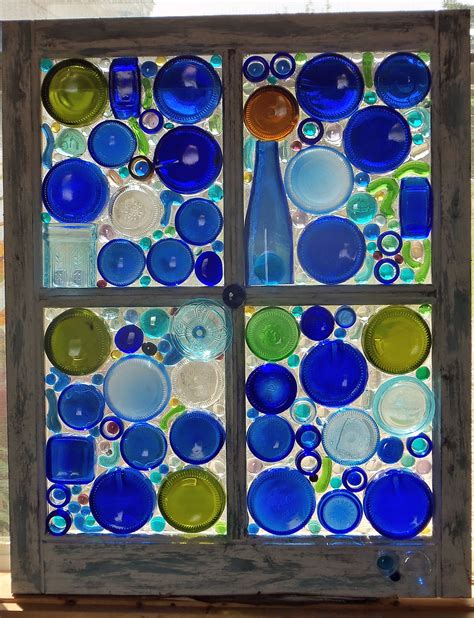 Bottle Bottoms On A Window Made By Yvette Glass Bottles Art Glass