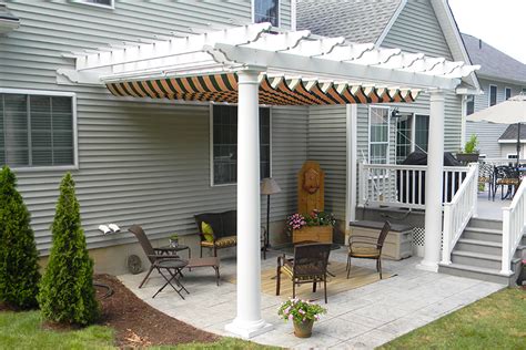 Large eye screws do the sliding and make easy work of extending and retracting the canopy. pergola w canopy