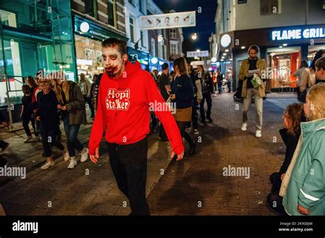 A zombie walks on the streets while scaring people. This year, again