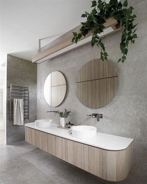 Curved Ensuite Bathroom Vanity In Oak With White Bench Top And Round