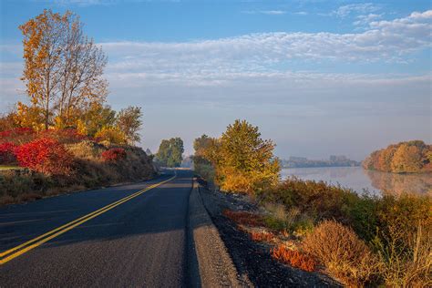 Fall Along The River Photograph By Lynn Hopwood Fine Art America