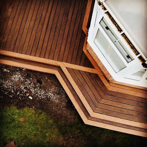 12 inch composite deck board sample. Trex Transcend Spiced Rum with Tiki Torch Burry Port ...