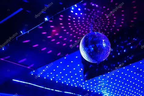 Disco ball ceiling light fixture pictures. Mirror disco ball with light reflection on the ceiling ...