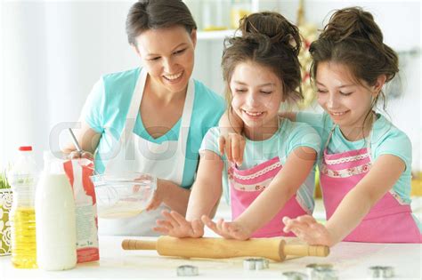 Mom And Daughters Cook Stock Image Colourbox