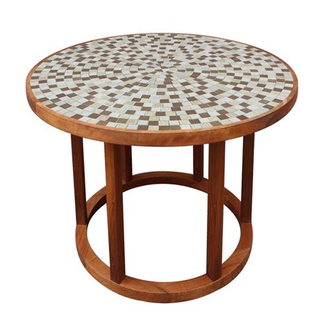 This is the provence dining table, but modified to have tiles set into the top. Ceramic tile top dining table by Gordon Martz