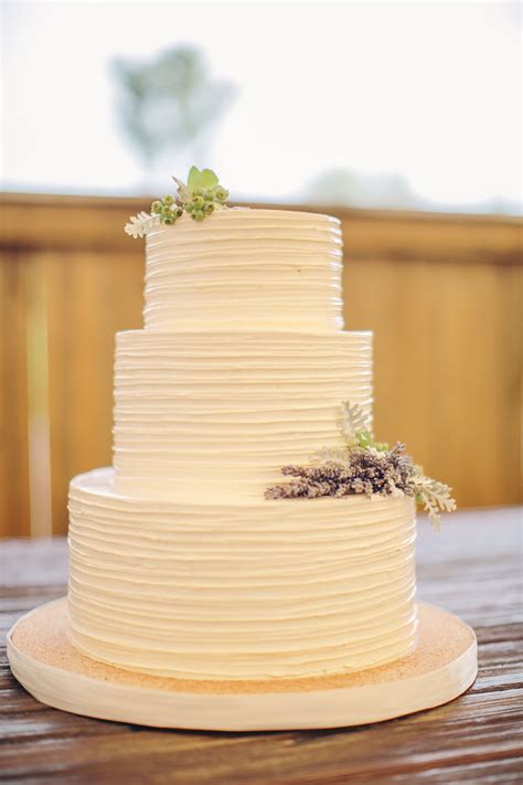 This cake, which is buttercream with fondant accents is as simple as it is cute, and. Simple Buttercream Tiered Wedding Cake