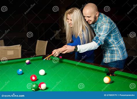 Picture Of Beauty Couple In Love Plays Pool Billiard For The Fir Stock Image Image Of