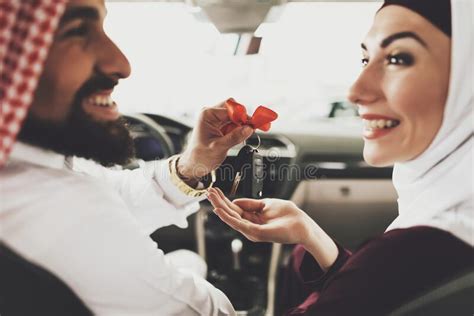 Arab Man Gives His New Car Keys To His Wife Stock Image Image Of
