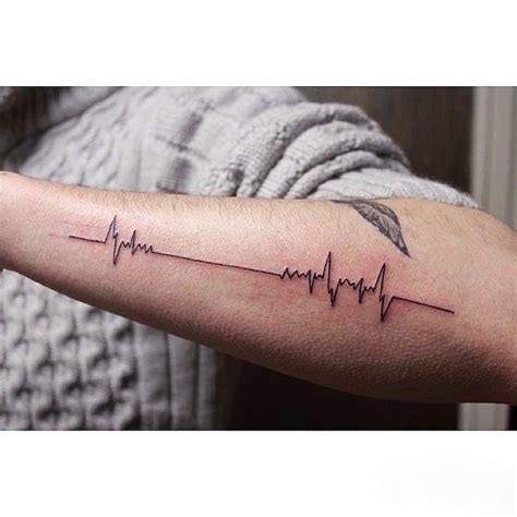 flatline 23 heartbeat tattoos that ll leave you breathless popsugar beauty
