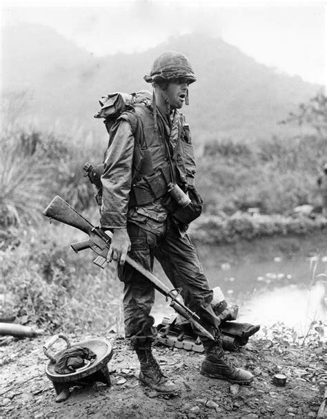 Pvt R Jones Of The 2nd Battalion 7th Marines Takes A Standing Break