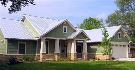 This photo from courtney rae in louisville, kentucky, shows how rustic green can instantly change a home's style. The green on the exterior is Sherwin-Williams Clary Sage ...