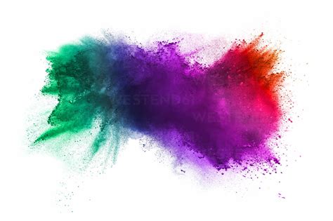 Multi Colored Powder Paint Splashing Against White Background Stock Photo