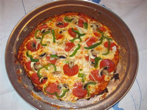 2 cups of all purpose flour + maybe a little extra 1/2 teaspoon of baking powder 1/2 teaspoon of table salt 1 tablespoon of olive oil 3/4 cup of water this recipe makes enough dough for 2 large, thin crust pizzas. America's Test Kitchen: New York Thin Crust Pizza | Made ...