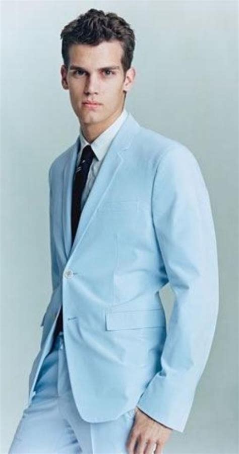 Cut from electric blue fabric this style pairs beautifully with a crisp white dress shirt and dark brown shoes. baby blue wedding suits for men - Di Candia Fashion