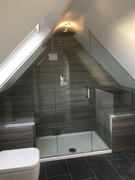 Whether looking to freshen up your small bathroom or design a new one, there are plenty of ways to imbue spaciousness and functionality if you design right. Frameless shower enclosure in gable roof loft conversion ...