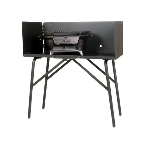 While i was going to experiment with the storage, i also decided to experiment with some other design features. Lodge Dutch Oven Cooking Table With Tall Windscreen - A5-7 ...