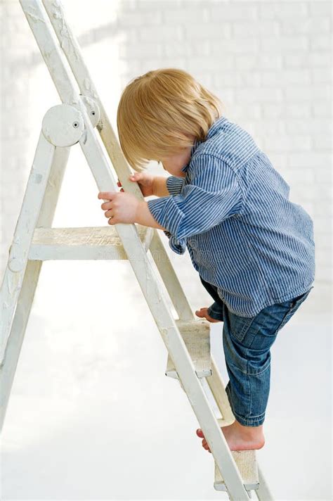 Kid Climbing The Ladder Stock Photo Image Of Aspiration 31100984