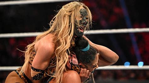 Why Does WWE RAW Superstar Carmella Wear A Mask