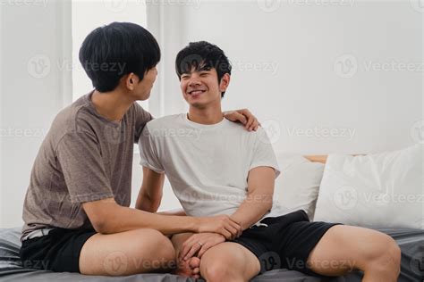 Handsome Asian Gay Couple Talking On Bed At Home Young Asian Lgbtq Guy