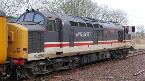 Refers to person, place, thing, quality, etc.): Class 37 Nos. 37116 and 37254 (Intercity livery) and PLPR ...
