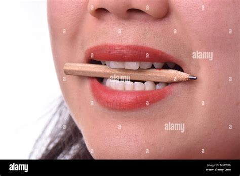 Angry Woman Biting Pencil Hi Res Stock Photography And Images Alamy