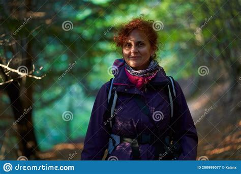 Female Nature Photographer Hiking Into The Forest Stock Image Image