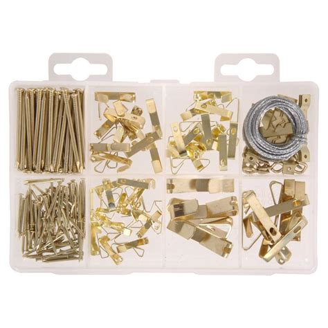 Simply install the tracks on wall. The Hillman Group 200-Pieces Picture Hanging Kit-130251 ...