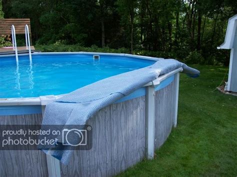Diy pool cover using pvc and a tarp to keep the water and leaves out of the pool and to make would you like to buy one yourself? Solar cover reels innovations? | Solar cover, In ground pools, Above ground pool