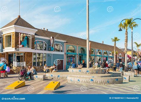 Pismo Beach Pier Plaza Shops And Restaurants And Resting People