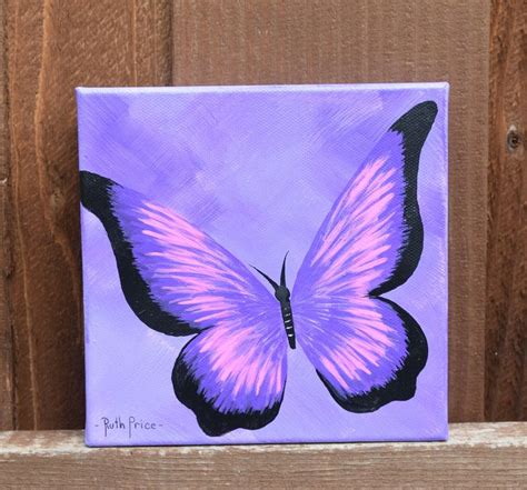 A Painting Of A Purple Butterfly On A Wooden Fence