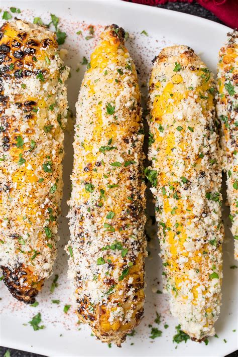 Seasoned with chili powder, cumin and onions. Grilled Mexican Street Corn - Cooking Classy