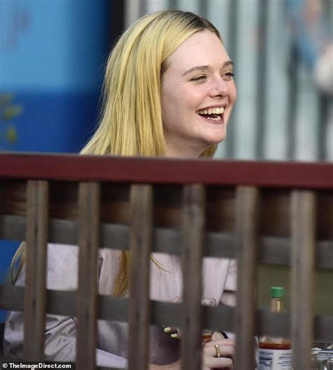 Elle Fanning Is Radiant As She Enjoys An Al Fresco Oyster Lunch With Rosé Wine Trends Now