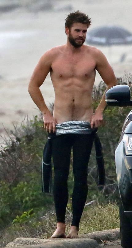 MAN CANDY Scruffy Liam Hemsworth Reveals Sexy Snail Trail After