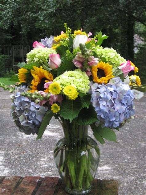 See more ideas about wedding flowers, flowers, fall wedding. Sunflowers and hydrangeas with pink rose and snapdragon ...