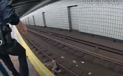 Man Falls Onto Brooklyn Subway Tracks Nypd Officers Pull Him To Safety With Train Coming